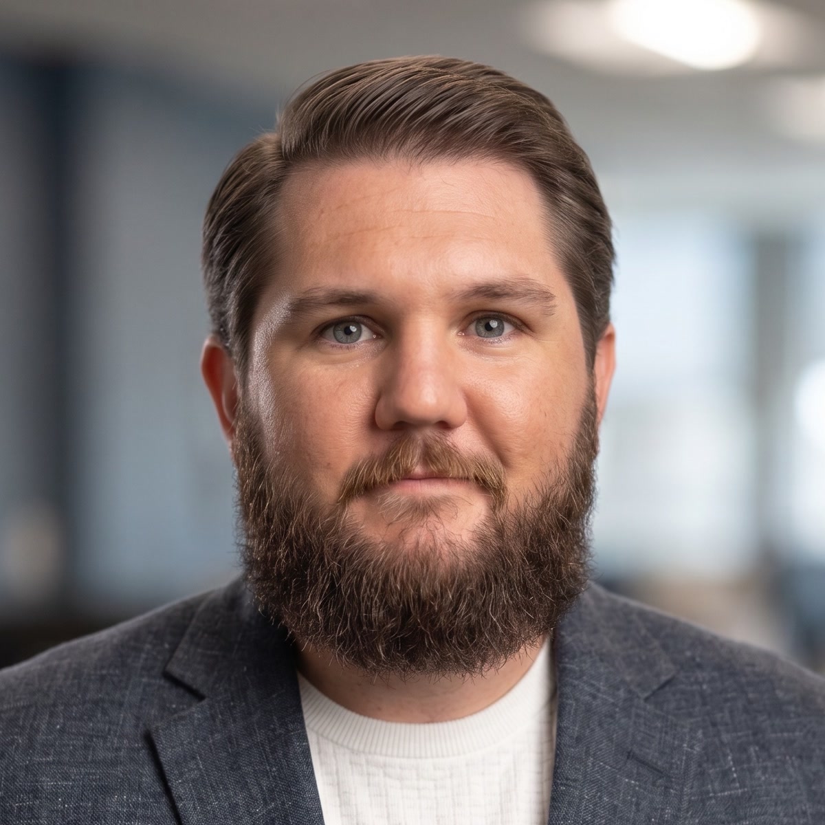 Professional headshot of Shane Reynolds.
